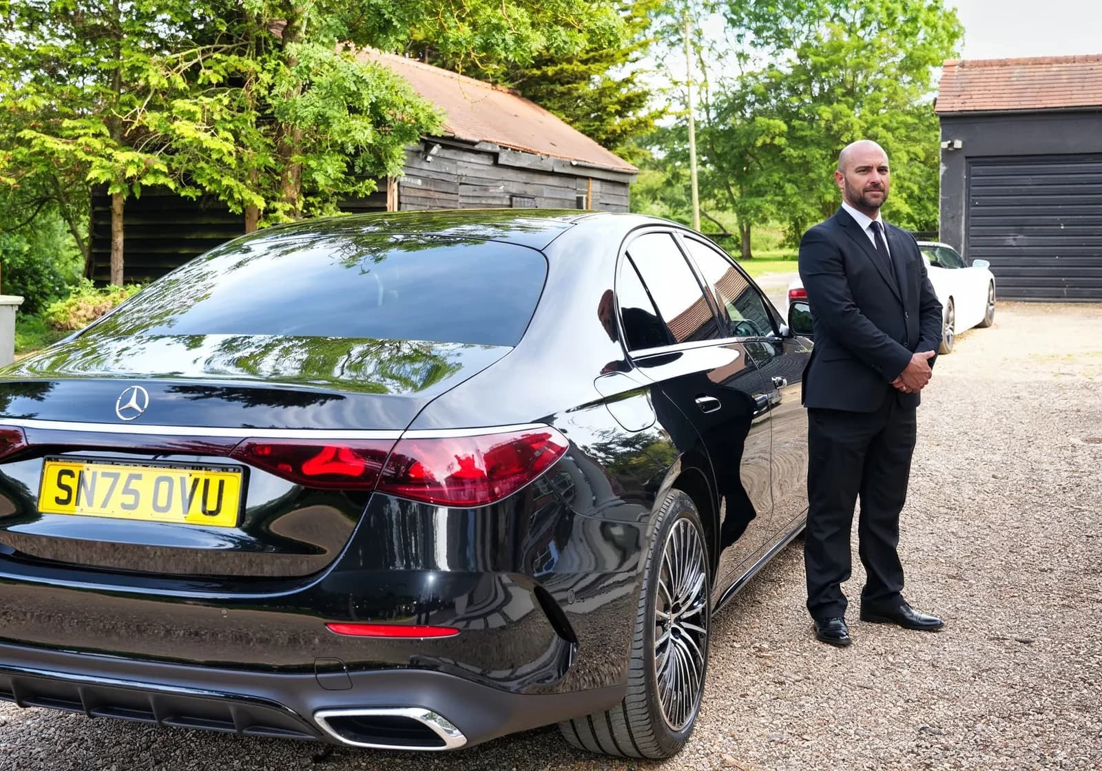 A black executive Mercedes-Benz E-Class saloon presented for Business Class chauffeur travel - view 5