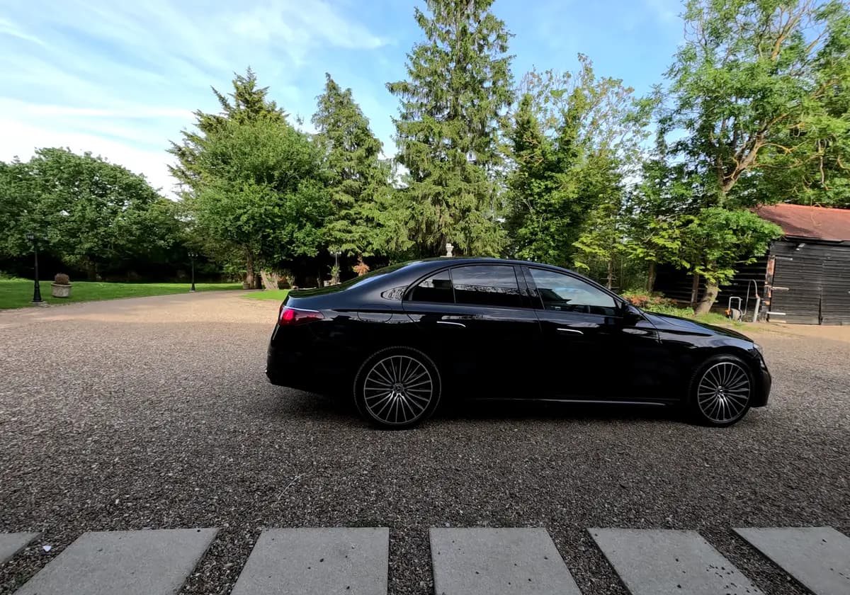 A black executive Mercedes-Benz E-Class saloon presented for Business Class chauffeur travel - view 6