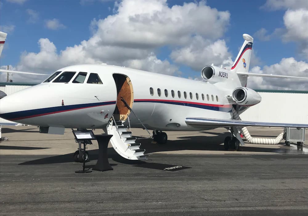 A private jet on the tarmac at a private aviation terminal