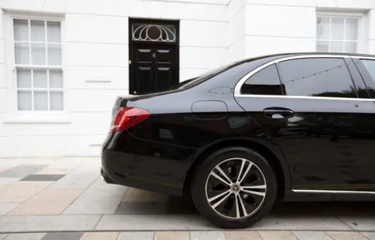 imgi 79 mercedes e class chauffeur car rear view 530x340